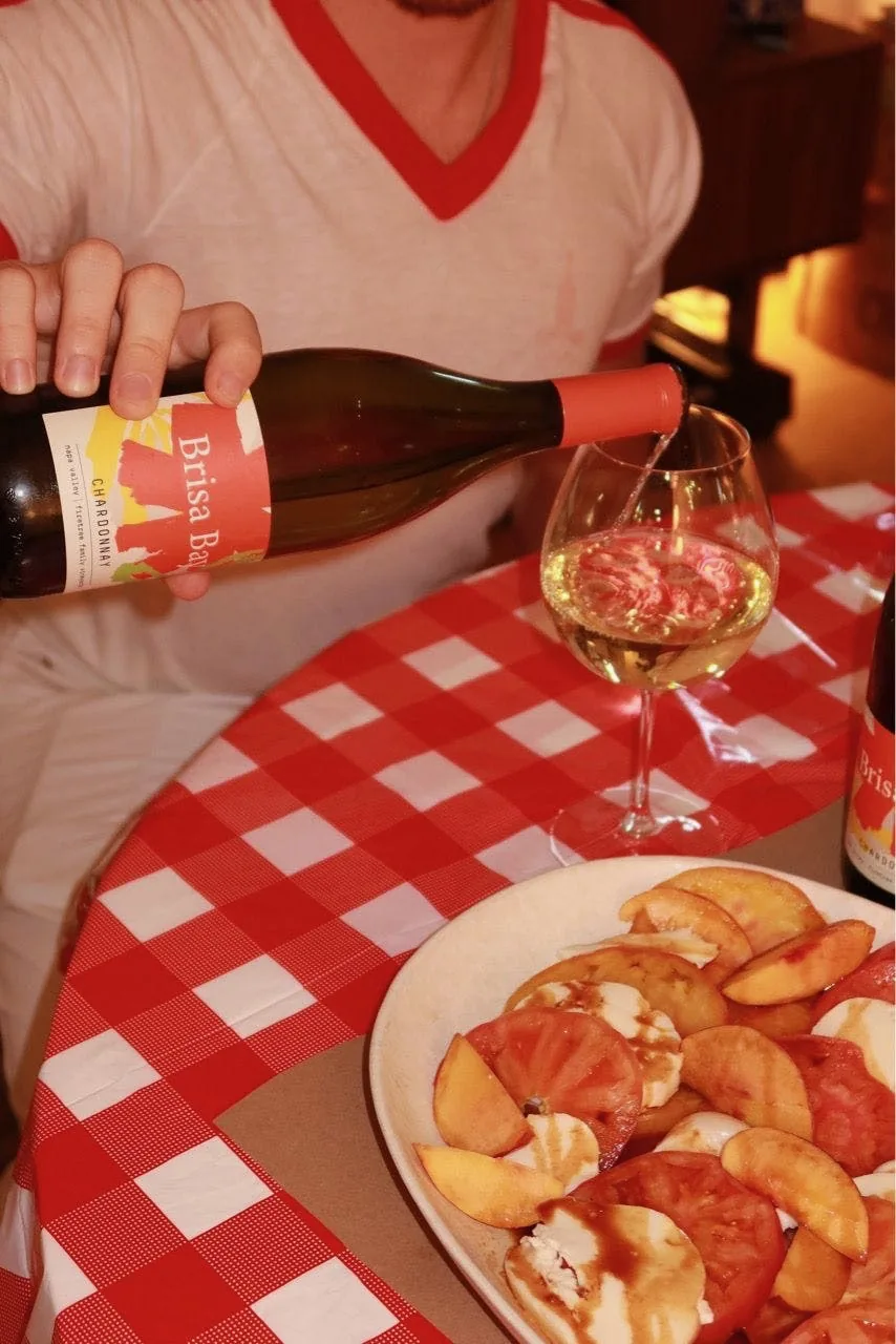 Pouring Brisa Bay at the table